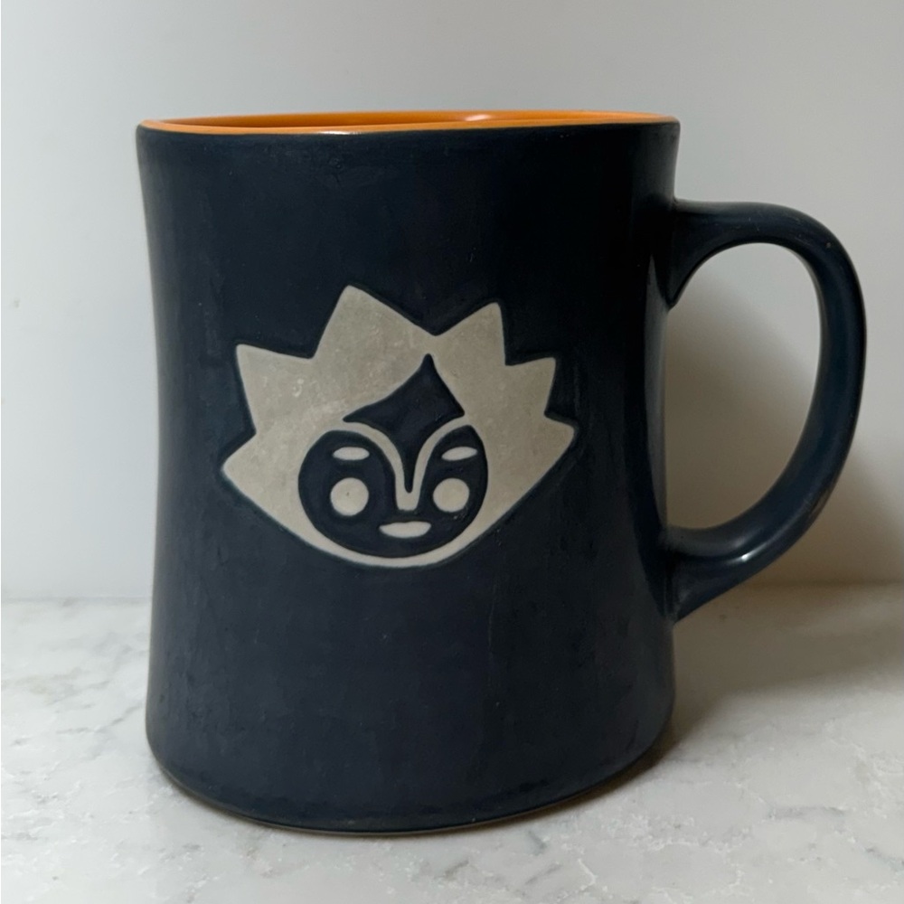 Starbucks 2011 Kenya Mermaid Sun Face Mug Matte Black / Orange 16oz